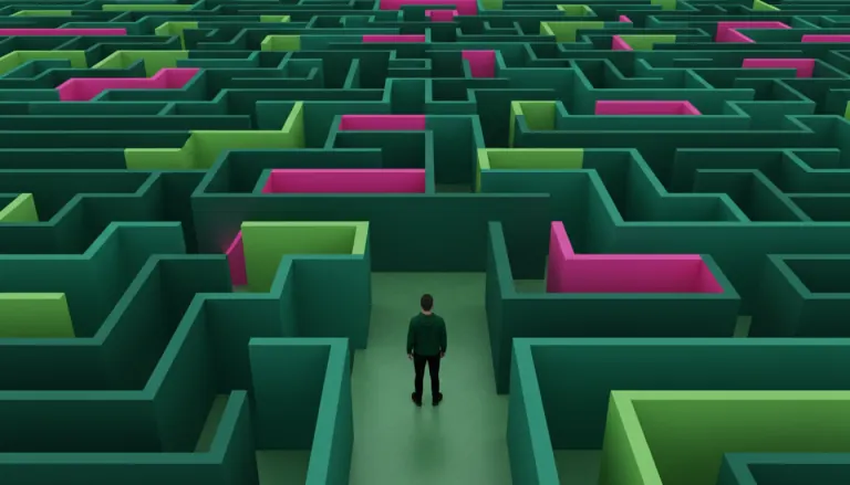 person stnding in front of a complex maze